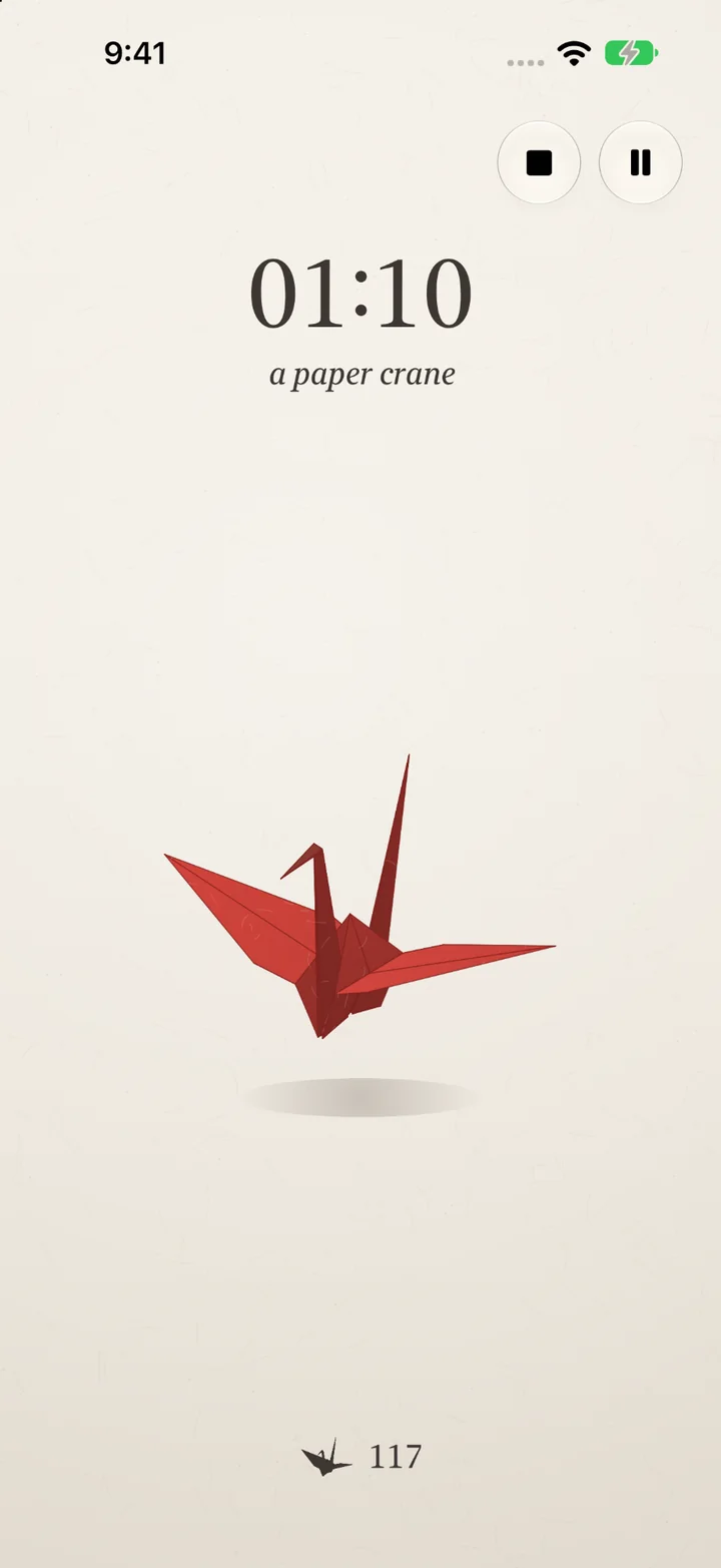 Little While running the Paper Crane theme: a red origami crane floating on cream paper under a 01:10 countdown.